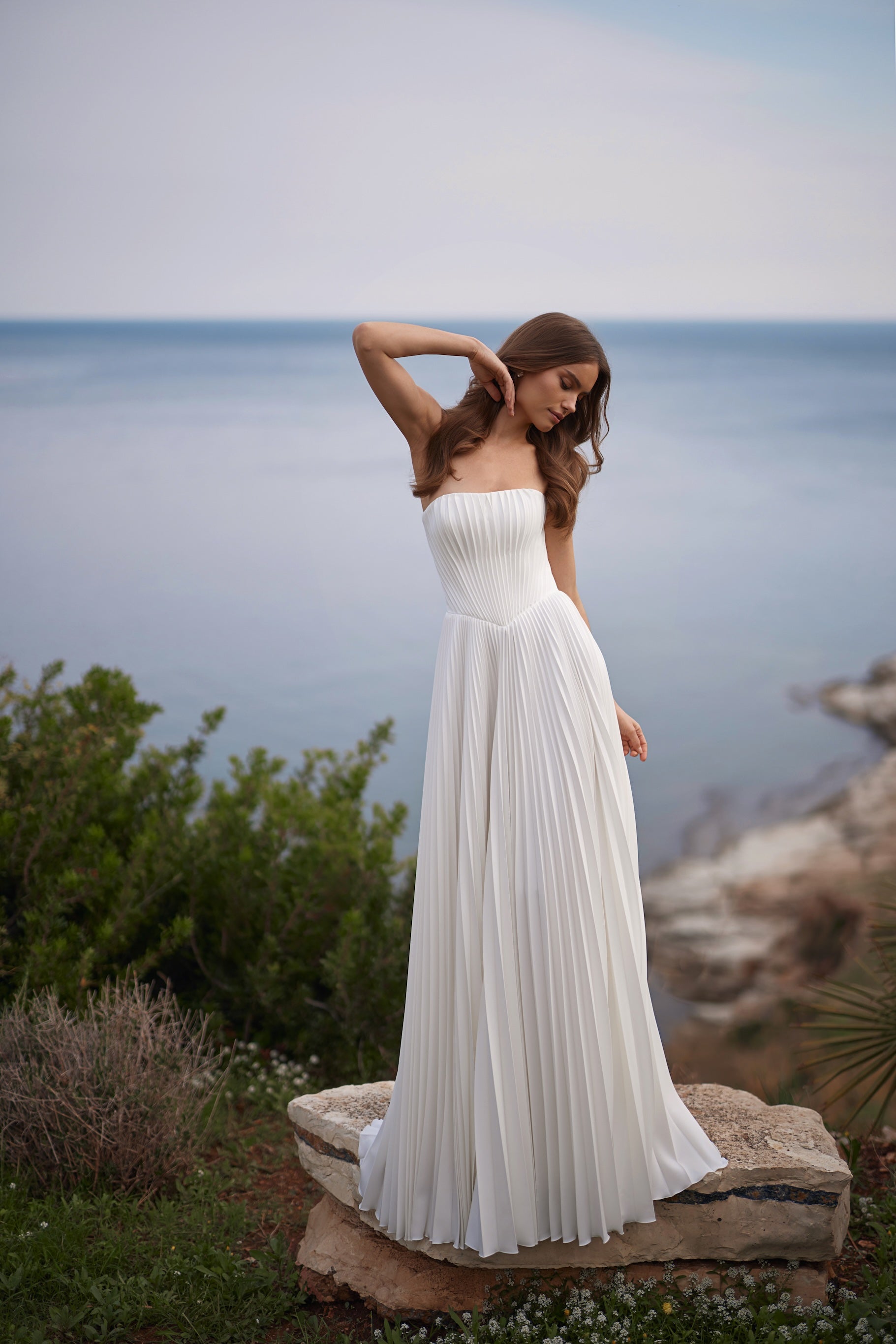 Plisseret brudekjole i chiffon, Basque talje og a-line skørt hos Maison Lou bridal atelier i Køge, sjælland Danmarks bedste brudekjolebutik